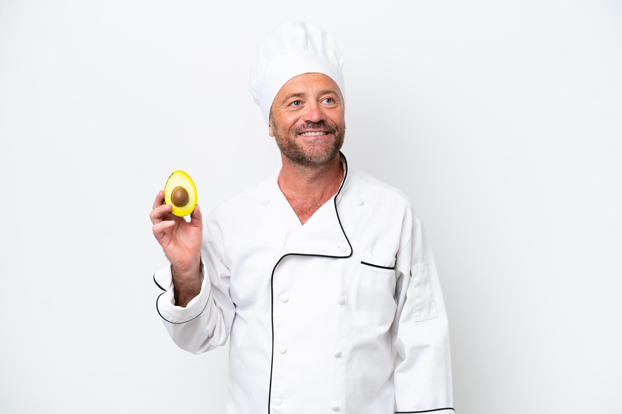 Head chef smiling in studio kitchen