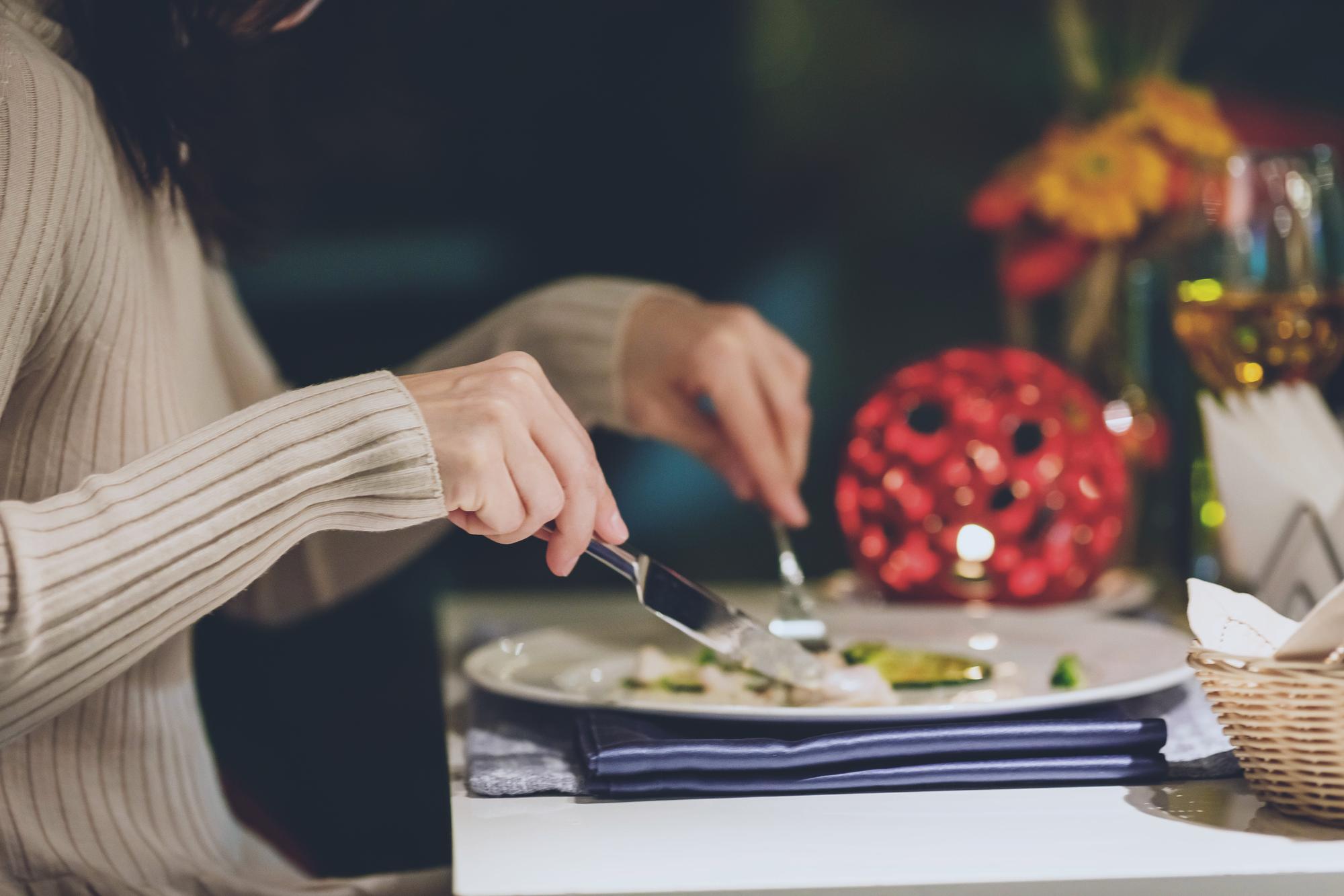 Workshop host arranging place settings